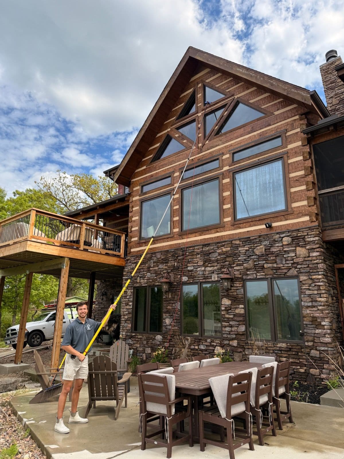 Impressive Tall Window Cleaning at Rustic Lake House image